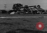Image of biplane landing United States USA, 1928, second 54 stock footage video 65675072950