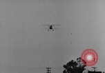 Image of biplane landing United States USA, 1928, second 59 stock footage video 65675072950