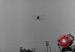 Image of biplane landing United States USA, 1928, second 60 stock footage video 65675072950