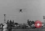 Image of biplane landing United States USA, 1928, second 62 stock footage video 65675072950