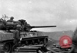 Image of US armor and infantry advancing in Ryukyu Campaign Pacific Theater, 1945, second 1 stock footage video 65675072977
