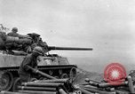 Image of US armor and infantry advancing in Ryukyu Campaign Pacific Theater, 1945, second 3 stock footage video 65675072977