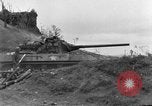 Image of US armor and infantry advancing in Ryukyu Campaign Pacific Theater, 1945, second 17 stock footage video 65675072977