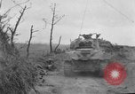 Image of US armor and infantry advancing in Ryukyu Campaign Pacific Theater, 1945, second 21 stock footage video 65675072977