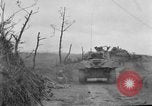 Image of US armor and infantry advancing in Ryukyu Campaign Pacific Theater, 1945, second 23 stock footage video 65675072977