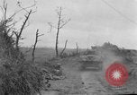 Image of US armor and infantry advancing in Ryukyu Campaign Pacific Theater, 1945, second 26 stock footage video 65675072977
