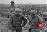 Image of US armor and infantry advancing in Ryukyu Campaign Pacific Theater, 1945, second 33 stock footage video 65675072977