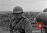 Image of US armor and infantry advancing in Ryukyu Campaign Pacific Theater, 1945, second 43 stock footage video 65675072977