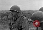 Image of US armor and infantry advancing in Ryukyu Campaign Pacific Theater, 1945, second 44 stock footage video 65675072977