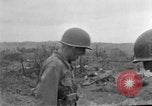 Image of US armor and infantry advancing in Ryukyu Campaign Pacific Theater, 1945, second 49 stock footage video 65675072977