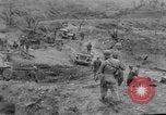 Image of US armor and infantry advancing in Ryukyu Campaign Pacific Theater, 1945, second 50 stock footage video 65675072977