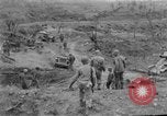 Image of US armor and infantry advancing in Ryukyu Campaign Pacific Theater, 1945, second 55 stock footage video 65675072977