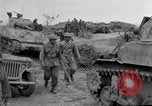 Image of US armor and infantry advancing in Ryukyu Campaign Pacific Theater, 1945, second 57 stock footage video 65675072977