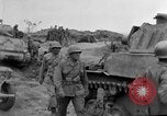 Image of US armor and infantry advancing in Ryukyu Campaign Pacific Theater, 1945, second 60 stock footage video 65675072977