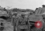 Image of US armor and infantry advancing in Ryukyu Campaign Pacific Theater, 1945, second 61 stock footage video 65675072977