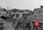 Image of US armor and infantry advancing in Ryukyu Campaign Pacific Theater, 1945, second 62 stock footage video 65675072977