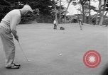 Standbild Präsident Dwight D Eisenhower spielt Golf Pebble Beach California USA, 1955, aus Sekunde 20 historischem Filmmaterial Videoclip 65675073187