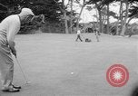 Standbild Präsident Dwight D Eisenhower spielt Golf Pebble Beach California USA, 1955, aus Sekunde 21 historischem Filmmaterial Videoclip 65675073187