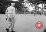 Standbild Präsident Dwight D Eisenhower spielt Golf Pebble Beach California USA, 1955, aus Sekunde 34 historischem Filmmaterial Videoclip 65675073187
