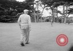 Standbild Präsident Dwight D Eisenhower spielt Golf Pebble Beach California USA, 1955, aus Sekunde 35 historischem Filmmaterial Videoclip 65675073187