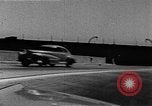 Image of WhiteHurst Freeway and temporary mall buildings Washington DC USA, 1950, second 49 stock footage video 65675073232