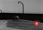 Image of WhiteHurst Freeway and temporary mall buildings Washington DC USA, 1950, second 52 stock footage video 65675073232