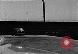 Image of WhiteHurst Freeway and temporary mall buildings Washington DC USA, 1950, second 53 stock footage video 65675073232