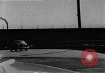 Image of WhiteHurst Freeway and temporary mall buildings Washington DC USA, 1950, second 54 stock footage video 65675073232
