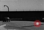 Image of WhiteHurst Freeway and temporary mall buildings Washington DC USA, 1950, second 55 stock footage video 65675073232