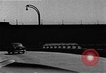 Image of WhiteHurst Freeway and temporary mall buildings Washington DC USA, 1950, second 56 stock footage video 65675073232
