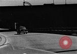 Image of WhiteHurst Freeway and temporary mall buildings Washington DC USA, 1950, second 59 stock footage video 65675073232