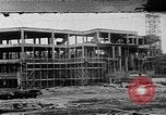 Image of school construction and suburban homes Washington DC USA, 1950, second 1 stock footage video 65675073233
