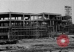 Image of school construction and suburban homes Washington DC USA, 1950, second 3 stock footage video 65675073233