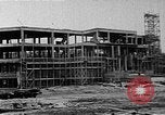 Image of school construction and suburban homes Washington DC USA, 1950, second 5 stock footage video 65675073233