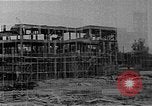 Image of school construction and suburban homes Washington DC USA, 1950, second 7 stock footage video 65675073233