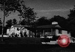 Image of school construction and suburban homes Washington DC USA, 1950, second 17 stock footage video 65675073233