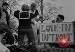 Image of hippies at a Detroit love-in Detroit Michigan USA, 1967, second 42 stock footage video 65675073277