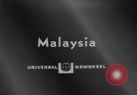Image fire cérémonie de marche Kuala Lumpur Malaisie, 1967, de la seconde 1 séquences d'archives historiques vidéo 65675073290