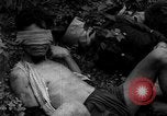 Image of Vietcong captured by Marines Vietnam, 1967, second 49 stock footage video 65675073301