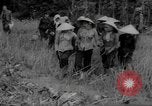 Image of Vietcong captured by Marines Vietnam, 1967, second 51 stock footage video 65675073301