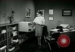 Image of woman worker arguing with boss United States USA, 1965, second 37 stock footage video 65675073400