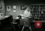 Image of woman worker arguing with boss United States USA, 1965, second 44 stock footage video 65675073400
