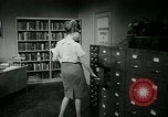 Image of woman worker arguing with boss United States USA, 1965, second 46 stock footage video 65675073400