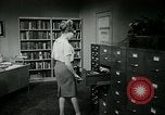 Image of woman worker arguing with boss United States USA, 1965, second 47 stock footage video 65675073400