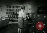 Image of woman worker arguing with boss United States USA, 1965, second 49 stock footage video 65675073400