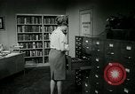 Image of woman worker arguing with boss United States USA, 1965, second 50 stock footage video 65675073400