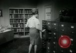Image of woman worker arguing with boss United States USA, 1965, second 51 stock footage video 65675073400