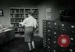 Image of woman worker arguing with boss United States USA, 1965, second 52 stock footage video 65675073400