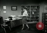 Image of woman worker arguing with boss United States USA, 1965, second 53 stock footage video 65675073400