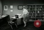 Image of woman worker arguing with boss United States USA, 1965, second 55 stock footage video 65675073400